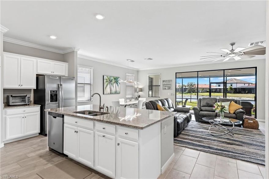 Enjoy beautiful sunset views over the lake as soon as you walk in the front door, from your kitchen, dining room, living room, master bedroom and lanai.  With upgraded light fixtures, gray paint, white cabinets, crown molding and gray tile floors throughout, you will feel relaxed and right at home. The master suite offers a large bathroom with double sinks, a walk-in closet, spacious shower and private water closet. The large den in this Smart Home is a great work-from-home office. The quiet Rookery Bay preserve behind you is the perfect environment for working and relaxing.  

The Artesia clubhouse features a resort style pool, billiard room, theater, fitness center and several gathering areas. You will enjoy strolling along the beautiful lakes, playing pickleball, riding your bike or walking your dog in this sprawling pet-friendly community with its own dog park. You will love the serene privacy of this home and all of the wonderful amenities that Artesia offers.