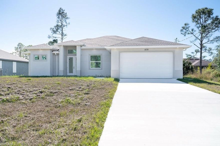 New construction 4 bed/3 bath with 2 Master Suites and a split floor plan. Home features impact windows, large porcelain tile throughout, and a bright open layout. Move-in ready with modern finishes and a serene natural setting.