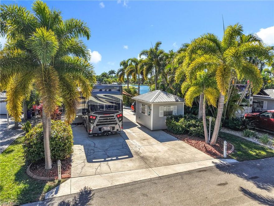 Welcome home to beautiful Lot D52.  Stunning views of the water awaits you while you relax in this paradise we call Cypress Woods RV Resort.  Pull your RV up on this spacious lot with accessory building that boosts stackable washer and dryer, small refrigerator, sink, shower, toilet, futon and many cabinets for storage.  This luxury ownership resort has a Welcome center that includes laundry, card room, fitness center, day spa, and pool with hot tub.  The Town Center has large meeting room with catering kitchen, stage, card room, another poll/hot tub and much more.  Enjoy the outdoors amenities such as tennis, shuffleboard, pickleball, and all the activities Cypress Woods has to offer.  Close to all South West Florida has to offer!!