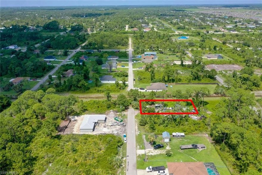 THE LOT IS CLEAN. THE PICTURES ARE BEFORE IT WAS CLEANED. Ready to build your vision? 0.25 acres of prime land await in Lehigh Acres, Lee County, FL! Seize this golden opportunity now! Discover the mesmerizing charm of Lehigh Acres, Lee County, FL – a city that echoes with a vibrant tapestry of history and culture! Embrace a community that thrives on its welcoming spirit, diverse population, and lively atmosphere that never fails to captivate. Known for its friendly neighborhoods and inclusive ambiance, this slice of paradise invites you to embark on a journey of endless possibilities. Picture yourself here, creating the life you’ve always dreamed of. Ready to make your mark in this captivating city?
