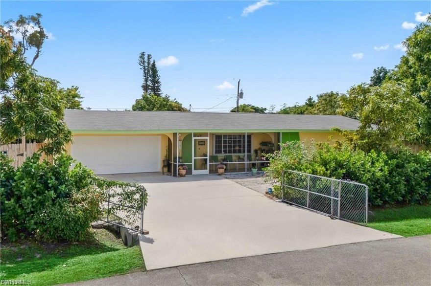 Enjoy effortless Florida living in this spacious 4-bedroom, 3-bath home set on an oversized lot in the heart of Fort Myers. The expansive backyard is a true standout, featuring mature fruit trees and endless possibilities—whether you envision a resort-style pool, lush gardens, room for the pets, boat/trailer storage, or simply a private outdoor retreat for relaxing and entertaining under the sun.  Designed with privacy in mind, the property is fully fenced and hedged and includes a generous side yard with a 16-foot-wide gate and two 30-amp outlets—perfect for RV or boat parking and charging. A storage shed adds extra convenience for tools, equipment, or outdoor hobbies.  Inside, the open-concept layout offers bright, inviting living spaces – a large Living Room with a Dining Area, open to the updated Kitchen. Down the hallway are 3 bedrooms, an en suite Primary Bedroom plus 2 generously sized Guest Bedrooms.  The Dining area leads to a sunny Florida Room and to the left is the 4th Bedroom also with an en suite Bath.  This entire area could also function beautifully as a private in-law suite or guest quarters, making the home ideal for multi-generational living.  Additional highlights include a 2 car garage, large indoor Laundry Room and an inviting front screened porch.  Electrical was updated 2024, re-roofed 2013. Located in Fort Myers Villas  a quiet, established neighborhood, this home offers easy access to shopping, dining, schools, and major roadways— approximately 20 minutes to RSW International Airport, about 20 minutes to Ft Myers Beach and Sanibel or to the River District of downtown Fort Myers.