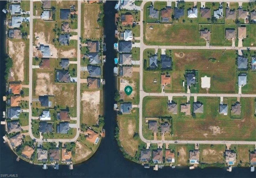 This Gulf access lot in Northwest Cape Coral offers quick access to Matlacha Pass and the Gulf of Mexico, perfect for fishing trips just 15 minutes away. Enjoy picturesque sunsets with its western rear exposure, and convenience with nearby amenities including Publix grocery and various dining options!!!