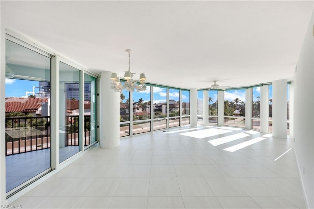 Photo of 4651 Gulf Shore BLVD N #207, NAPLES, FL 34103 (MLS # 225075905)