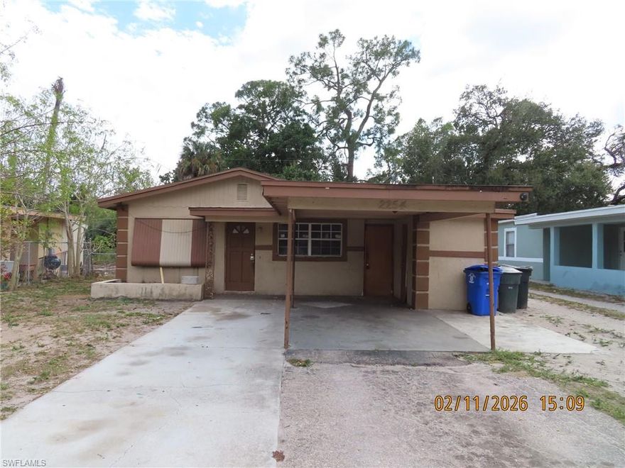 Great investment opportunity!!! This two bedroom one bath home is located in town and is priced to sell. It's features include 917+/- square feet of living area, attached carport and outbuilding.