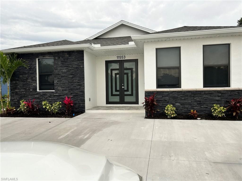 Photo of 10830 St Lucia CT, BONITA SPRINGS, FL 34135 (MLS # 226005755)