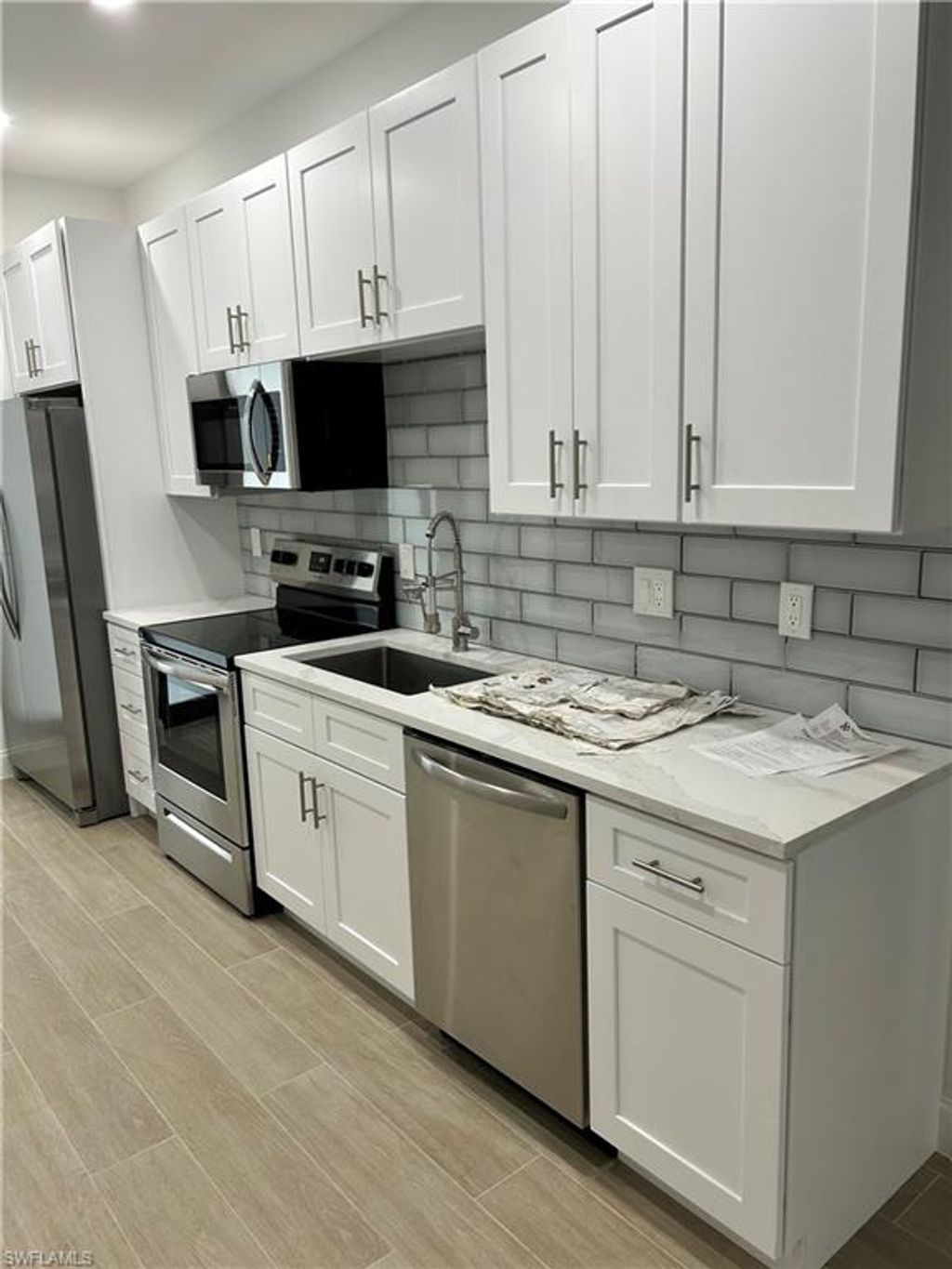 Photo of 10830 St Lucia CT, BONITA SPRINGS, FL 34135 (MLS # 226005755)