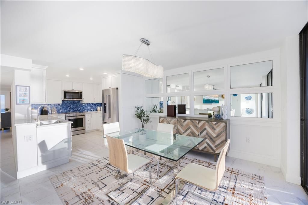 Photo of 9715 Gulf Shore DR #103, NAPLES, FL 34108 (MLS # 225083310)