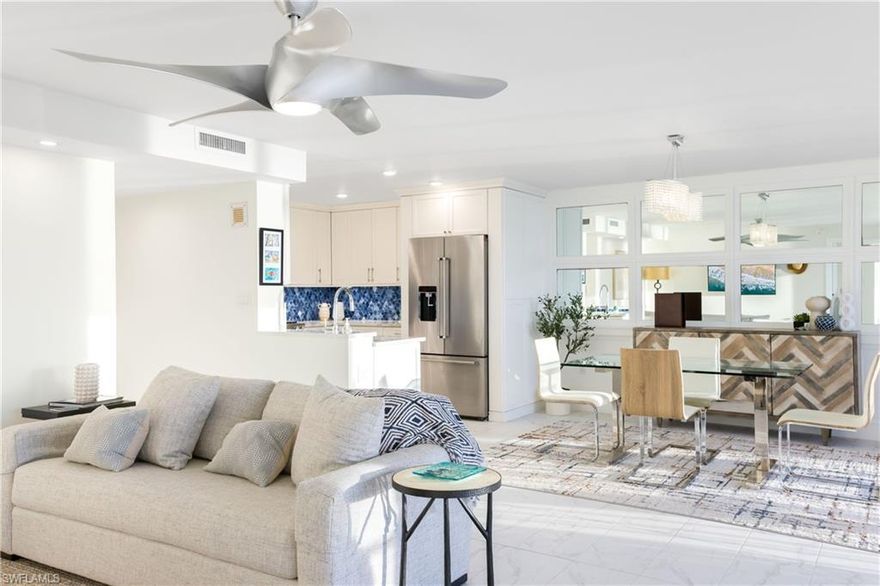 Experience coastal elegance at its finest in this exquisite 3-bed, 2-bath, fully renovated luxury condominium perfectly positioned on the pristine sands of Naples. *(WALL IN MASTER BATH CAN COME DOWN TO MAKE MASTER LARGER AND HAVE GULF VIEWS FROM BED)*! Designed for the discerning buyer, this residence combines sophisticated style with the ease of beachfront living. Step inside to discover high-end finishes throughout, from designer fixtures to premium luxury flooring that flows seamlessly from room to room. The open-concept living space is bathed in natural light and offers panoramic, unobstructed Gulf views—the perfect backdrop for Naples’ iconic stunning sunsets. The gourmet kitchen features upscale cabinetry, sleek countertops, and top-tier appliances, while each bedroom is thoughtfully appointed for comfort and serenity. The California Closets in every room provide exceptional organization and storage. Enjoy the ultimate beachfront lifestyle with direct private beach access, allowing you to go from your residence to the sand in seconds. The building’s prime location places you within walking distance to the Ritz-Carlton, Waterside Shops, and Mercato, offering world-class dining, shopping, and entertainment right at your doorstep. Whether as a full-time residence or a coastal retreat, this condo delivers an unparalleled blend of luxury, convenience, and breathtaking natural beauty.