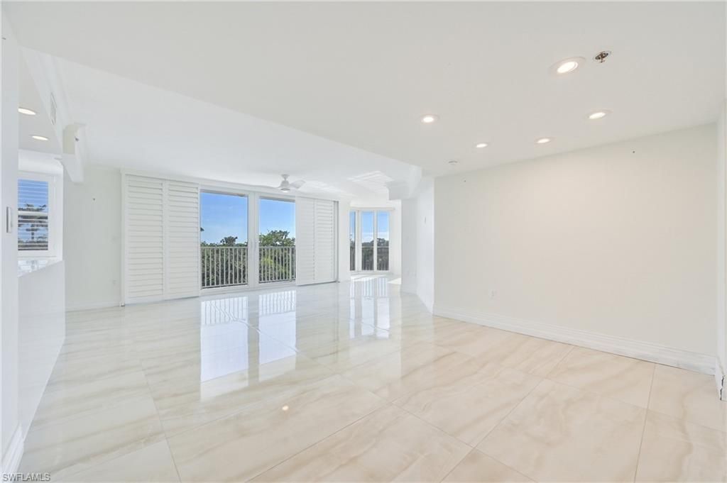 Photo of 6361 Pelican Bay BLVD #202, NAPLES, FL 34108 (MLS # 226021292)