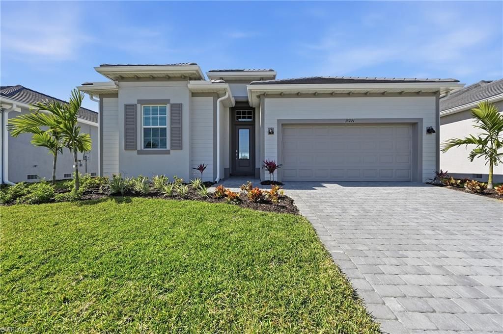 Photo of 15721 Raveneli CT, FORT MYERS, FL 33908 (MLS # 226005804)