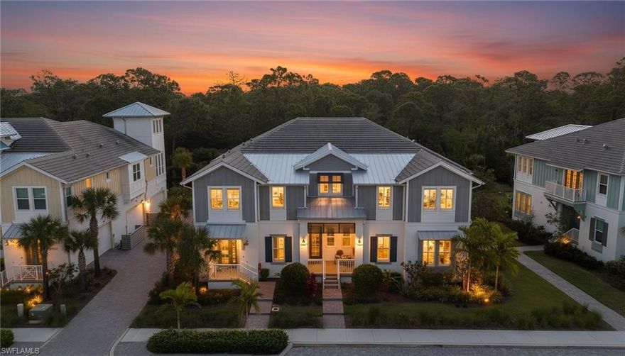 Private, pristine, and beautifully appointed, this exceptional 3-bedroom + Den, 3-bath coach home with peaceful nature preserve-views in the coveted community of Isles of Collier Preserve stands out as a remarkable find.  Refined coastal elegance meets the quiet beauty of Southwest Florida’s natural landscape in a residence that perfectly balances luxury, privacy, and lifestyle. Perfectly positioned at the edge of the preserve, it offers expansive, unspoiled views of lush greenery, creating a tranquil retreat that feels worlds away yet minutes away from everything.
Thoughtfully designed and lightly lived in, this easy to maintain lock and leave home showcases a bright spacious open-concept floor plan that blends coastal sophistication with effortless comfort. Soaring beamed ceilings, crown molding, and walls of windows fill the living spaces with natural light while framing lush tranquil nature views. The elegant great room flows seamlessly into the dining area, gourmet kitchen and sunroom—ideal for entertaining or relaxed everyday living.
The chef-inspired kitchen is a standout, featuring a large island with breakfast bar seating, quartz countertops, soft-close cabinetry, under-cabinet lighting, and premium finishes throughout. Whether hosting guests or enjoying a quiet morning coffee, the space is both functional and beautifully appointed.
Architectural details such as the dramatic wood stairwell, vaulted ceilings, and private in-residence elevator elevate the home’s sense of style and convenience. Impact glass windows and doors provide both peace of mind and quiet interior living.
Residents enjoy lakeside dining at the Overlook Bar & Grill, resort-style and lap pools, tennis, pickleball, bocce, a state-of-the-art fitness center, kayaks and kayak launch, dog park, and over seven miles of scenic biking and walking trails winding through protected preserves and waterways. 
All of this is just minutes from the world-class dining, shopping, and white-sand beaches of Old Naples, Florida offering the perfect balance of a peaceful retreat and vibrant coastal living.