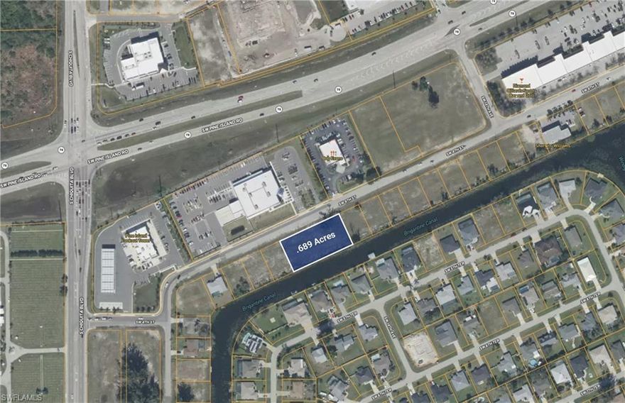 Positioned in one of Cape Coral’s fastest-growing commercial areas, this 30,000± square foot site offers an outstanding development opportunity along the highly active Pine Island Road corridor. The property sits on a freshwater canal and is fully equipped with city water, sewer, and natural gas, providing the infrastructure needed for a wide range of commercial uses.

This combined parcel site offers excellent flexibility and is well-suited for flex space, professional or medical office, restaurant, retail development, or even the opportunity to build custom “caves” or hobby garages with friends.

Conveniently located parallel to Pine Island Road, the property sits directly behind the new Cape Coral Post Office, Bob Evans, 7-Eleven, and Take 5 Oil Change, and just north of Chiquita Boulevard. The site benefits from easy access and steady traffic flow along 4th Street, making it an ideal location for businesses seeking strong visibility and accessibility.

With surrounding commercial growth continuing at a rapid pace, this property represents a rare opportunity to secure land in one of Cape Coral’s most active and expanding business corridors.