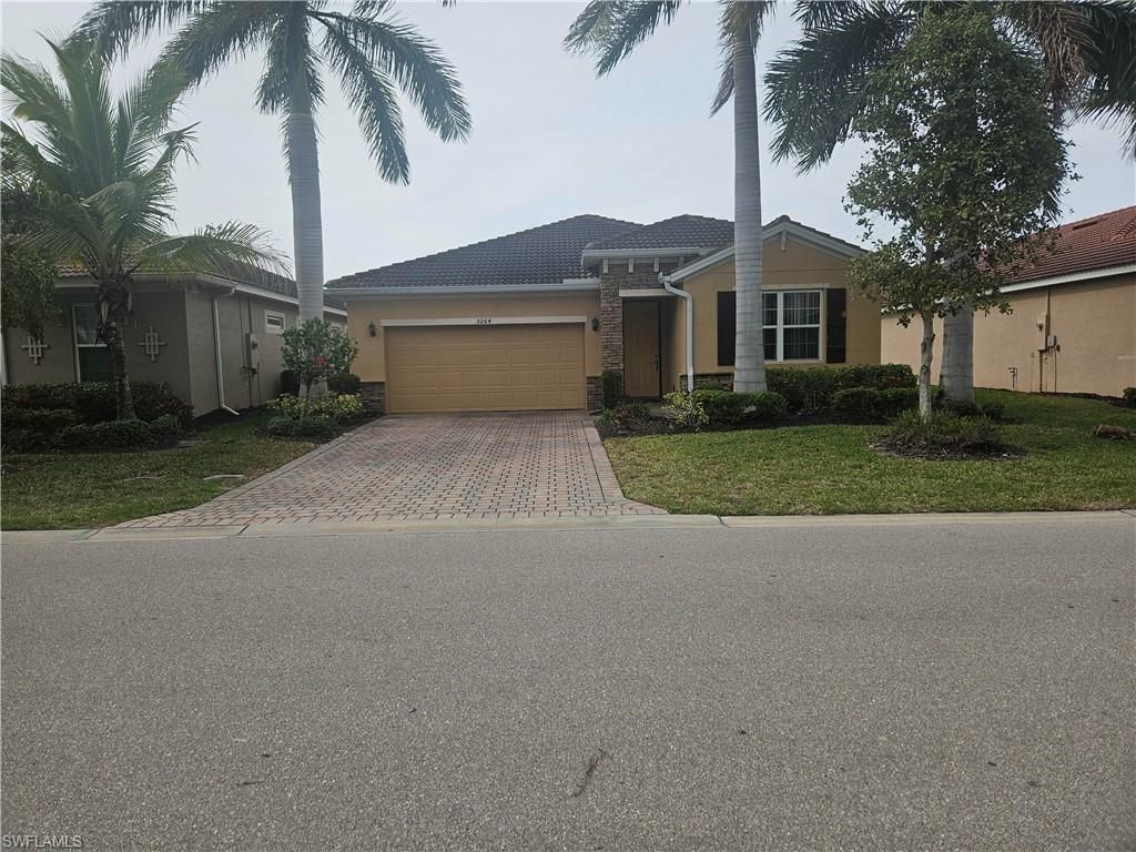 Photo of 3264 Royal Gardens AVE, FORT MYERS, FL 33916 (MLS # 226003512)