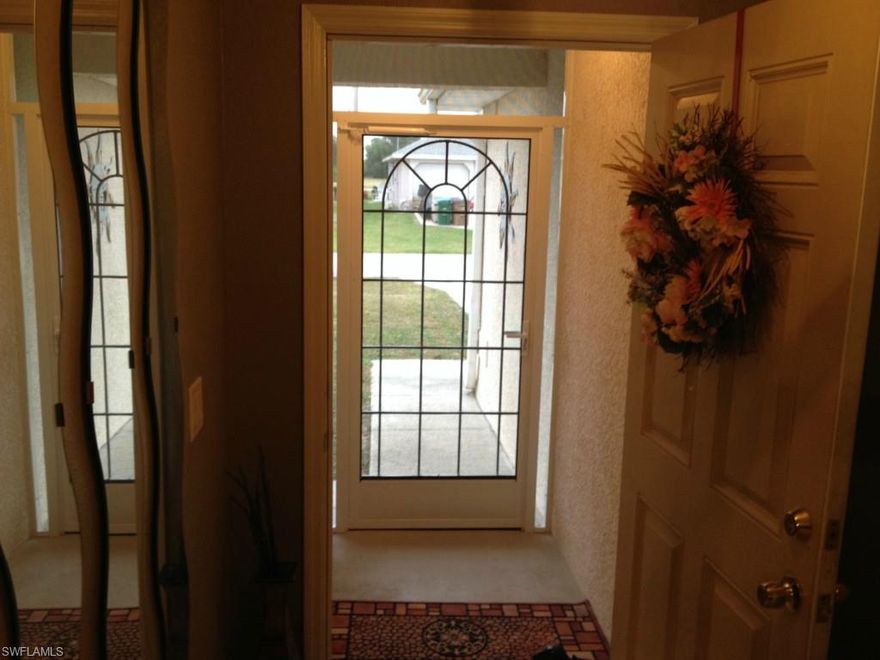 Here it is! This beautiful home is move in ready! Walk in and say WOW! All tile flooring thru-out all wood cabinets, all granite counter tops, beautiful neutral paint and comfy screened lanai all waiting for the buyer that wants it all done and done nicely! This is availble for quick possession as seller has found a home.
Agents, this is a show and sell! One look and you found your buyers the nice home that they have been looking for! The large open floor plan allows for a huge great room and the home appears to be much bigger than the sq. footage would indicate. Compare to larger homes! There is an R/O under the kitchen sink, glass top stove, side by side refrigerator. Nice walk-in shower and separate tub in master bath, well organized custom closet built-ins an walk-in closets too. The entry is screened and has a foyer with custom mirrors and with an entry closet at front door. The home has a West rear exposure with plenty of room to add a pool! You will feel the love that the seller put into this home when you walk-thru the door! Don't wait, this is going to sell fast....