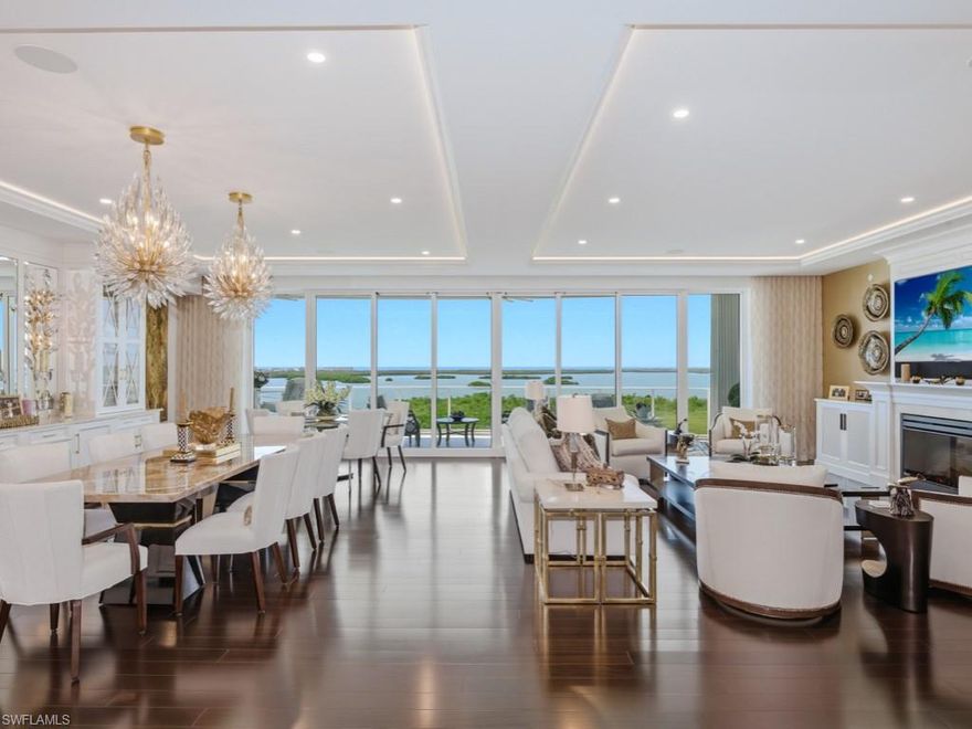 Experience the pinnacle of luxury and privacy in Bonita Bay—Omega 902.  A spacious home with over 4,210 square feet of amazing living space under air, with 3 bedrooms plus Den, Office and 3 1/2 baths.  This elegant home features many high-end finishes and furnishings, top quality furniture by Robb & Stuckey and Clive Daniels 9all fabrics were custom ordered), Crystallo Bar Counter with LED Lighting, induction cooktop, Pompeii Quartz Volaza kitchen island and countertops, California closets, feature fire place, SONOS, Mirage African Mahogany wood floors and much more.  Enjoy outdoor dining and ever-changing sunsets over the Estero Bay and the Gulf of Mexico from your over-sized terrace, with electric hurricane shutters with screen and shades.  The home also features an air-conditioned private 2-car garage located on level 2 of the secure parking garage, just a short elevator ride away.  An extra garage parking space (in addition to the private garage) is included.  2 separate air-conditioned storage spaces are also included.  Designed by Miami-based architect Robert Swerdroe and rising 26 stories, Omega features only 3 residences per floor (67 residences total) offering low density in an exclusive setting.  The home offers unobstructed, panoramic views of the Estero Bay and the Gulf of Mexico beyond. Omega has 24-hour reception services in the lobby, with on-site management, maintenance staff and house keeping staff, for a true concierge experience.  Amenities at Omega include a resort-style pool,  men’s and women’s spas with steam room, fitness room, billiards room, and large private social room. Private guest suites are available for your overflow guests.  Enjoy special times entertaining your friends and family in the large rooftop terrace of Omega--with 2 outdoor kitchens with bar and relaxation area and 2 spas.  Residents in Bonita Bay enjoy 12+ miles of walking/biking paths and 3 nature parks, plus the new, private Bonita Bay beach club on the Gulf of Mexico. Optional Bonita Bay Club features world-class golf (5 courses), tennis/pickleball, clubhouse with gourmet dining, and 6,000 sq.ft. Lifestyle Center with spa services and fitness staff.  This home is located in a quiet and peaceful natural setting, but is within easy reach of gourmet dining and shopping, and the RSW International Airport.  You must experience this home in person to appreciate how truly special it is.  Note: Private showings are arranged by appointment only.