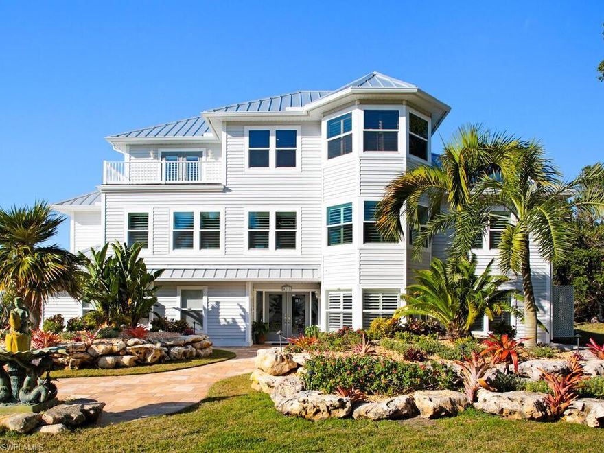 This enchanting home has been remodeled with no expense spared on design or décor. Designed with emphasis on the tranquil water views of Pine Island Sound, and the adjacent Historic Shell Mound. Located in the finest gated community Pine Island has to offer, Galt Island. As you enter this meticulous home, the gracious entryway leads to the stairway, or elevator, to the upper floors. The entire home has commanding views of the Sound that are second to none. The open main level features a chef's kitchen with quartz counters, Thermador appliances (w/ gas range), and a butler's pantry. The kitchen overlooks multiple living spaces, and a large wet bar that provides plenty of room for your family gathering and entertaining. The main level also has two ensuite bedrooms with private bathrooms. The luxury master suite covers the third level with elegance at every turn and outstanding views with an additional office and a sitting area. After glorious function, there is fun – the screened pool & tiki hut entertainment area with full kitchen that flow right into your own private beach and dock, including 2 covered boat lifts (10K lb - 25ft & 5K lb - 20ft). A true water enthusiasts dream!  ABSOLUTE MUST SEE HOME!