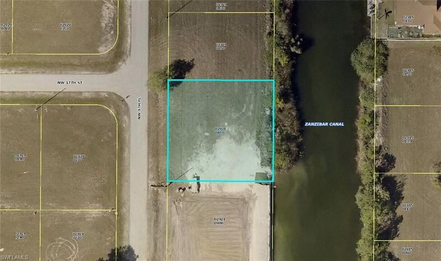 Oversized lot on a wide canal.  Great opportunity to build your dream home.