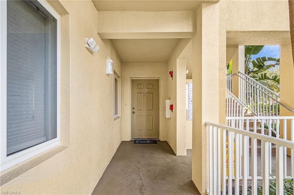 Photo of 10020 Maddox LN #114, BONITA SPRINGS, FL 34135 (MLS # 225065169)