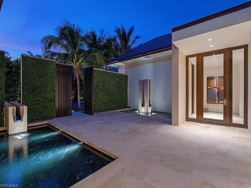 Photo of 3655 Fort Charles DR, NAPLES, FL 34102 (MLS # 226019200)