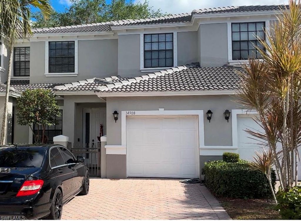 Photo of 14908 Summit Place CIR #26, NAPLES, FL 34119 (MLS # 226013755)