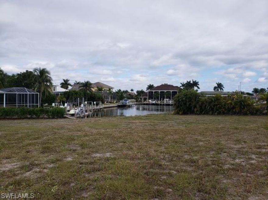 EXTREMELY LARGE HOMESITE WITH WIDE WATER VIEW AND DIRECT ACCESS TO MARCO RIVER IN MINUTES. THIS IS A UNIQUE LOT AND HAS MANY POSSABILITES FOR YOUR NEW CUSTOM BUILT HOME CLOSE TO SHOPS AND SERVICES ONLY MINUTES TO MARCO ISLANDS BEAUTIFUL BEACH.