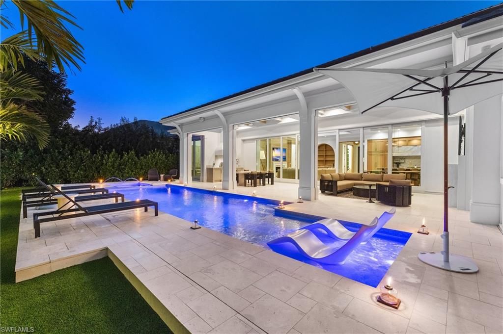 Photo of 660 Wedge DR, NAPLES, FL 34103 (MLS # 226000613)