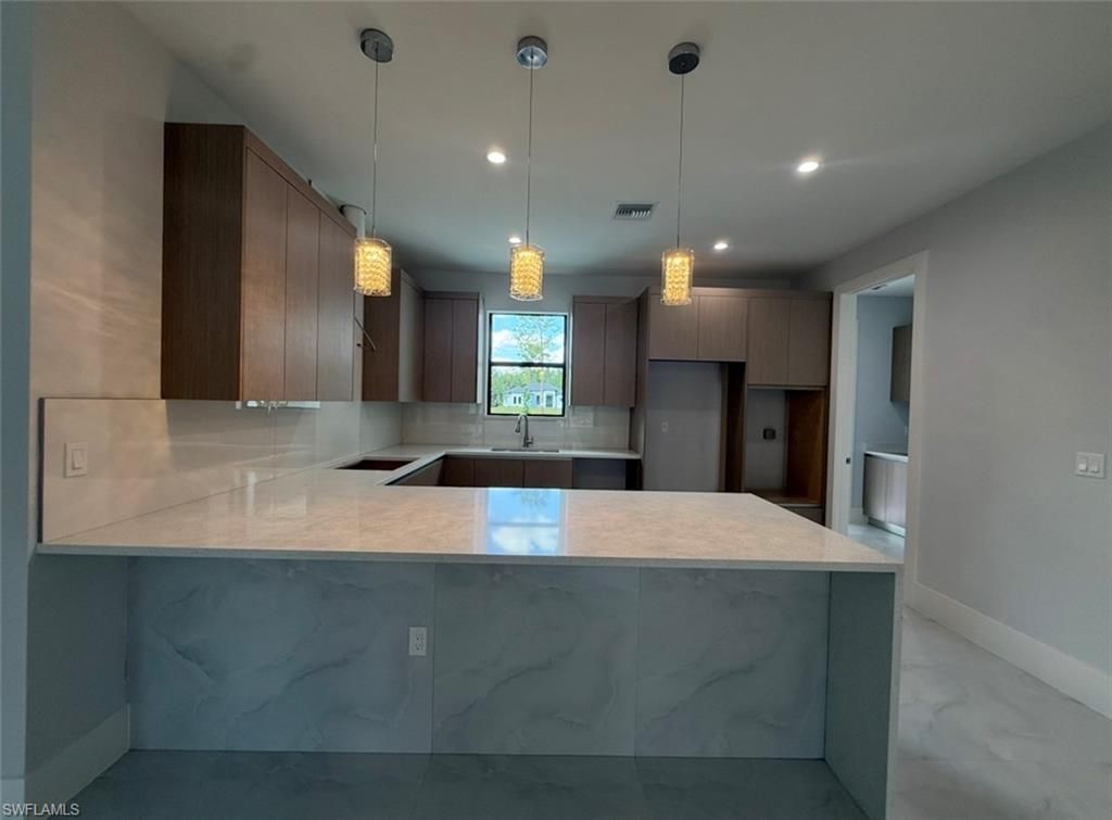 Photo of 4274 16th AVE NE, NAPLES, FL 34120 (MLS # 226016994)