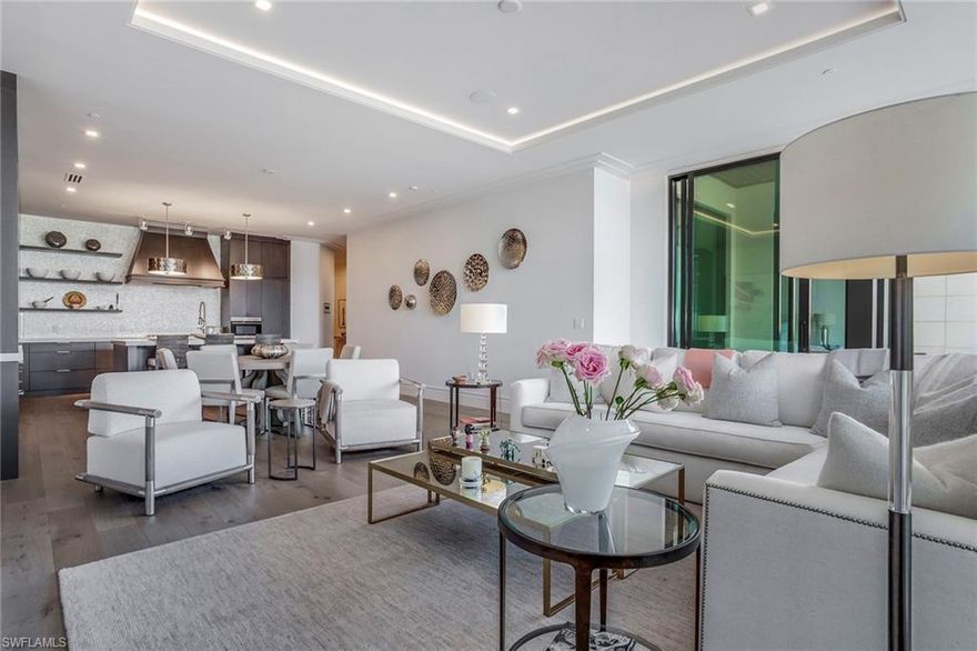 505 on Fifth, one of Naples' most sought-after addresses. This luxurious and beautifully finished, spacious residence offers an opportunity to live in one of Naples' newest and most sought-after luxury condominium buildings in downtown Naples. Boasting high ceilings, floor-to-ceiling glass sliders, hardwood flooring and a spacious and open floor plan with an oversized expansive outdoor terrace. Entertain in the open gourmet kitchen with abundant custom cabinetry, an oversized kitchen island with quartz countertop, luxury appliances and a gorgeous wet bar. The luxurious master suite includes 2 walk-in, fully fitted closets and a stunning bathroom, a guest en-suite, den, powder room and fully fitted laundry complete the residence. 204 features a contemporary design, a chic, light and bright feel combined with exceptional upgrades and fine details. This residence is ideally suited for the demands of a luxurious-modern lifestyle. Situated in the heart and vibe of famous 5th Ave South, surrounded by some of the city's finest restaurants, bars, cafes, shops. Socialize on 5th with friends in the evening, then retire to the peace and tranquility of this special residence.