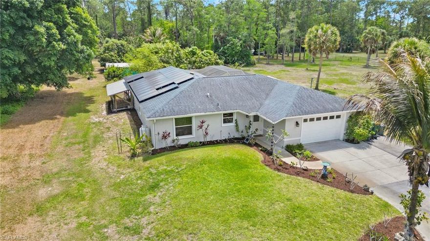 Positioned in the path of explosive growth within Golden Gate Estates a street over from collier blvd, this exceptional 3 bed / 2 Bath Pool Home on 1.14-acres offers a rare opportunity to secure a great renovated home in one of the most strategically evolving corridors of Naples on a secluded dead end street. 

Set on a deep homesite with desirable northern rear exposure, the property offers an ideal place to come home and relax by the pool, in the salt water hot tub or hanging out by the camp fire around the fully irrigated, matured 40 fruits trees with 30 different varieties of fruit and if you have a storm you have no worries with your whole home generator and hookup. With no HOA restrictions, the flexibility here is unmatched and you are only 2 miles from the New Gate Gold Club, 8 mins to the new Great Wolf Lodge, 10 mins from 75 and 26 mins to downtown Naples with lots of restaurants and great beaches.