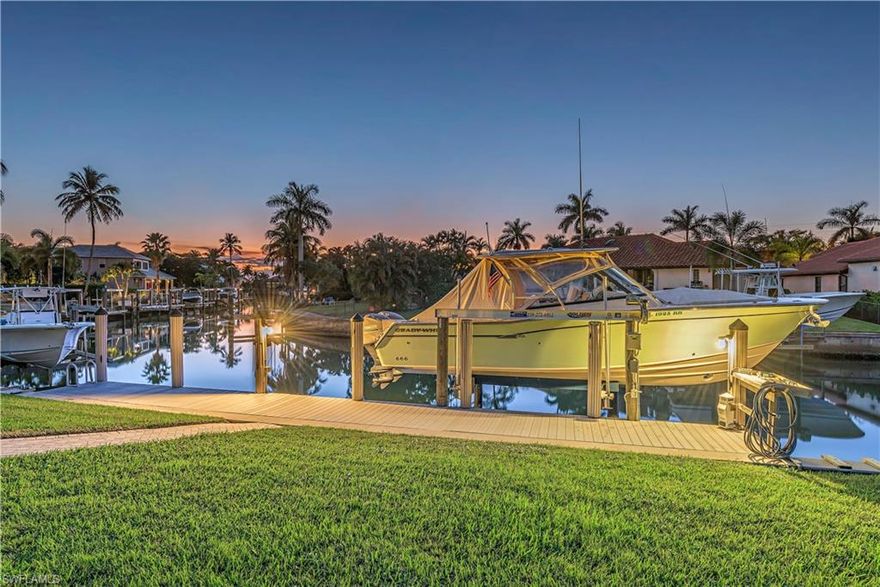 Coastal, charming, fantastic location, amazing view, are just a few of the adjectives used to describe this wonderful home.  Built in 1972 on a scenic lot in Royal Harbor, just 11 lots from the intracoastal, this home has been totally renovated with a contemporary, open gourmet kitchen with all new Viking appliances, white custom cabinets & granite counter tops; making this a wonderful space for entertaining.  The new “wood” tile floors add to the costal charm & luxury lifestyle.  There is also a new A/C system in the garage & solid wood doors throughout.  The lanai has new screens and is spacious with plenty of room to sit and enjoy the weather in paradise next to a nice-sized heated pool.  The dock and the new lift with remote will hold a 14,000-lb.boat and has both electricity & water.  Reach the Gulf of Mexico via Gordon Pass in a no time at all with no bridges to worry about. Don’t miss out on this opportunity to own this truly gorgeous coastal cottage and enjoy the best of the SW Florida lifestyle. Royal Harbor is minutes away from Naples famous beaches and the gourmet restaurants, charming shops, theater and art galleries of 5th Avenue and 3rd Street South. View the 3D Tour!