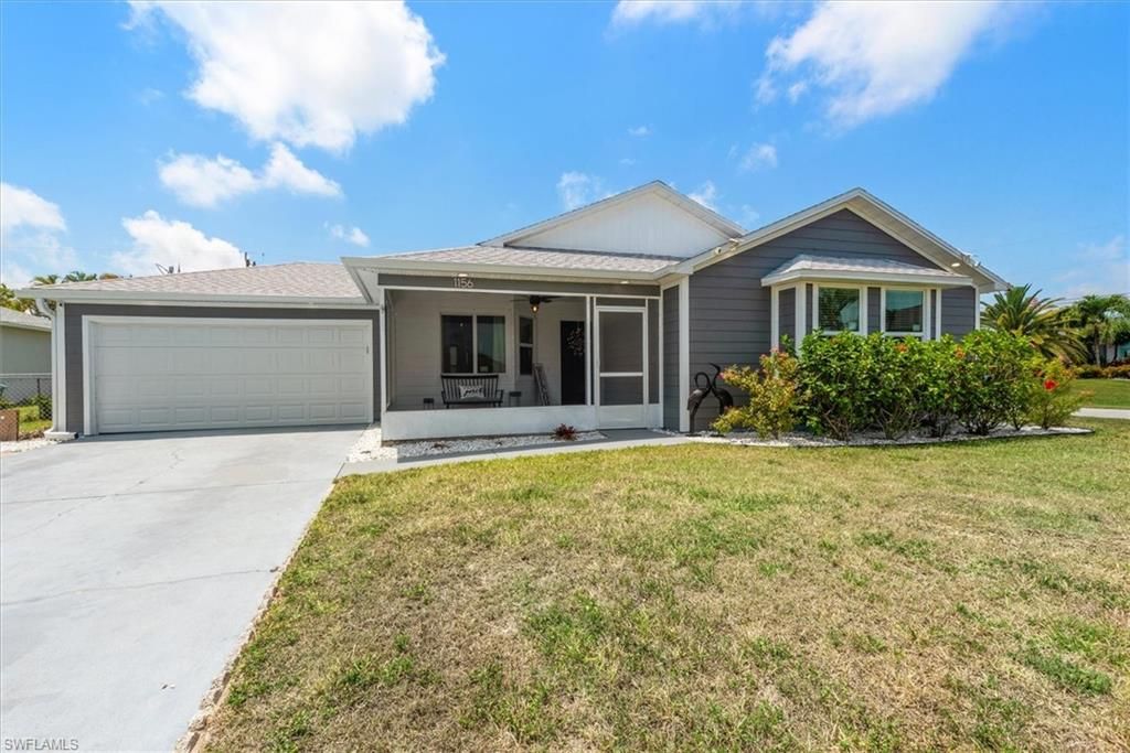 Photo of 1156 SW 41st TER, CAPE CORAL, FL 33914 (MLS # 226017998)