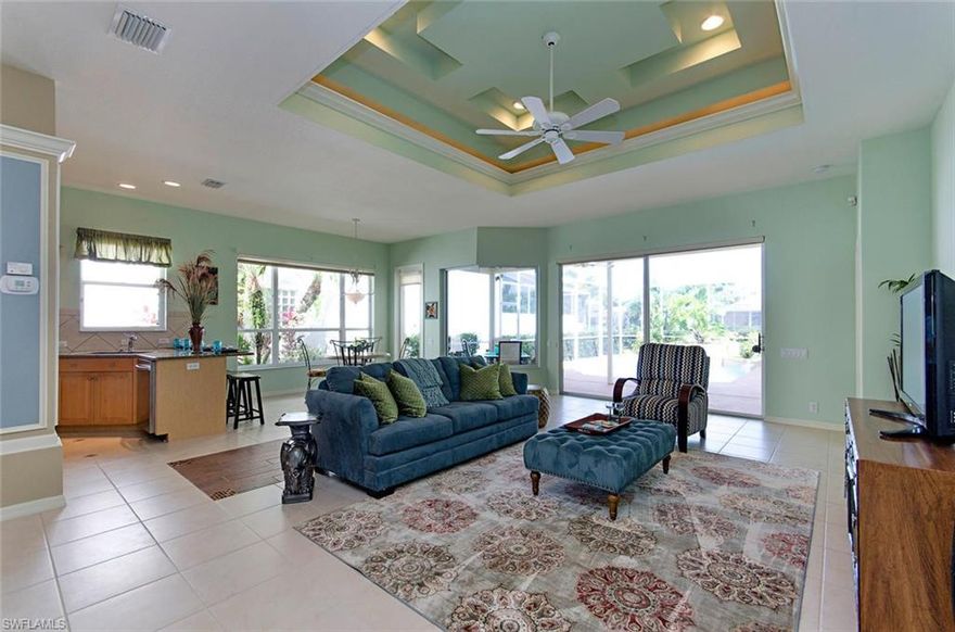 H.10086 - Recently Remodeled.  New Paint, Carpet, Granite Countertops In Kitchen And Brand New Stainless Steel Appliances Including The French Door Refrigerator.  Newer Air Conditioning System Including New Duct Work, New Pool Heater & New Frameless Master Shower Door. Wood Plantation Shutters In All Three Bedrooms, High Coffered Ceilings & Canned Lighting.  This Turnkey Furnished Home Has A Modified Open Floor Plan With Tile In Great Room, Kitchen, Halls & Foyer With An Extra Craft Or Hobby Room.  Located In The Lovely ANA'S PLACE Section In "The Strand" Having A Wildlife Preserve Across The Street; Seen Just Outside Your Door.  Heated Waterfall Pool, Double Entry Doors With New Hardware, 2 Car Garage And Separate Golf Cart Garage Door.  Lots Of Glass... Light & Bright!