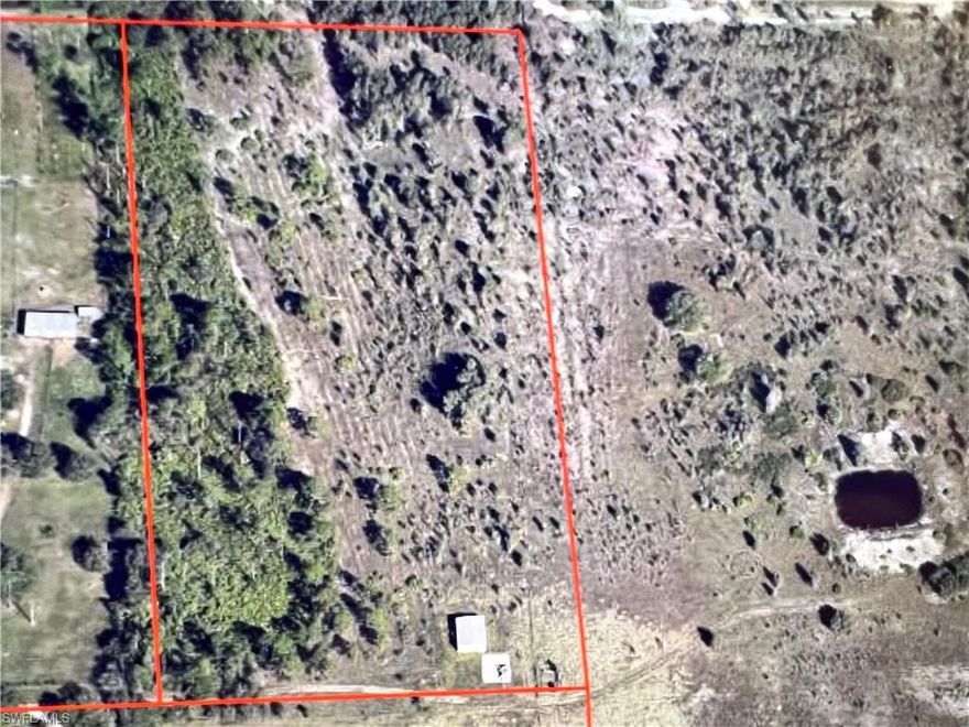 Fabulous, completely fenced 10-acre parcel in northeastern corner of Lee County.  Wonderful rural area in a GREAT LOCATION of rapid growth between SR 82 and Corkscrew Road. 10,000 home community recently approved to west of Wildcat Drive.  Quiet country-feel yet close enough to easily reach town, dining and shopping just minutes away.  GREAT OPPORTUNITY TO BUILD YOUR PERFECT DREAM HOME OR RANCH.  Picture the horses or cows out your back door.  Lots of potential! Newer, large steel, insulated 30x40 building on concrete pad on the property together with additional 30 x 40 concrete pad.  Store your tools, equipment, van, RV.  Land currently used for Agriculture: AG-2.