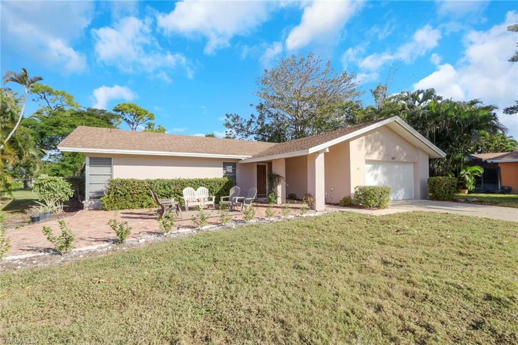 Photo of 687 Cypress WAY E, NAPLES, FL 34110 (MLS # 225079743)