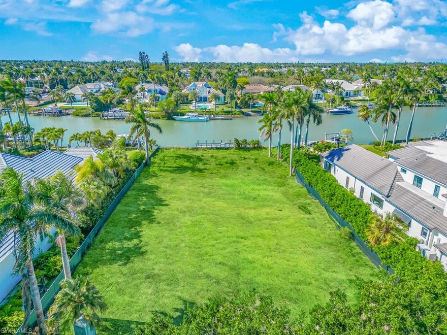 Build anew in Port Royal with this deep lot opportunity on Galleon Drive.  The location combines a Southwest exposure with captivating views of Runaway Bay, and the property showcases 104 feet of panoramic waterfront views and offers direct access to the Gulf with no bridges.  The .61-acre estate lot also comes complete with architectural plans by Jeff Harrell.  The highly desired enclave of Port Royal is ideally situated just a short stroll from the pristine white sand beaches of Naples and near the upscale dining, world-class shopping, and entertainment options found at 3rd Street South and 5th Avenue South. Property owners are also eligible to become members of the prestigious Port Royal Club.