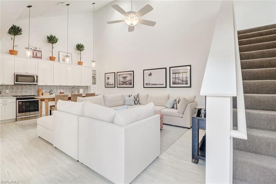 Don't miss this beautiful courtyard home in the North Naples Community of Quail Woods Courtyards. This Villa lives like a single family home and just underwent a complete renovation with plank tile floors throughout main living level, brand new master bath and a wonderful use of space in this redesigned kitchen with granite countertop and stainless steel appliances completely open to the living room.  Large screened in courtyard with an oversized sun deck off of second floor loft leaves no shortage of outdoor private living space.