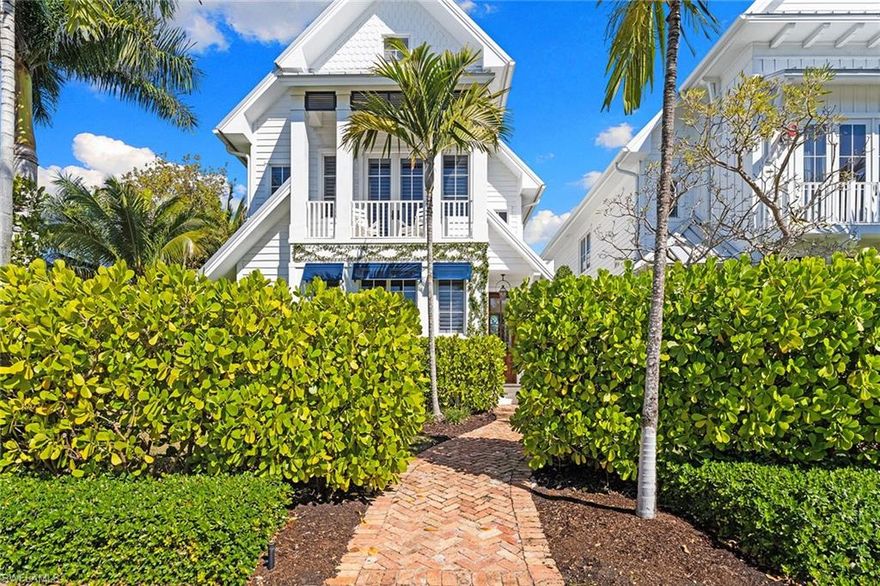 Perfectly positioned on a corner lot in the heart of Old Naples, 901 10th Avenue South is a stunning 2020-built coastal retreat offering the rare combination of privacy and walkability to the beach and Third Street South.
Designed by MHK Architecture, this two-story, four-bedroom residence exudes relaxed sophistication with soaring vaulted ceilings, sun-drenched interiors, and seamless indoor-outdoor living. Western exposure bathes the home and pool area in warm afternoon light, creating the ideal setting for golden-hour entertaining and tranquil evenings under the Naples sky.
The main living spaces are grounded by beautiful natural limestone flooring, enhancing the home's breezy, organic aesthetic. The chefs kitchen is both striking and functional, featuring a statement Lacanche, Sub-Zero range, refrigerator and freezer, custom cabinetry, and thoughtfully curated finishes that blend timeless craftsmanship with modern luxury. Inviting yet refined, this exceptional residence captures the essence of sophisticated Naples living in one of the areas most desirable locations.