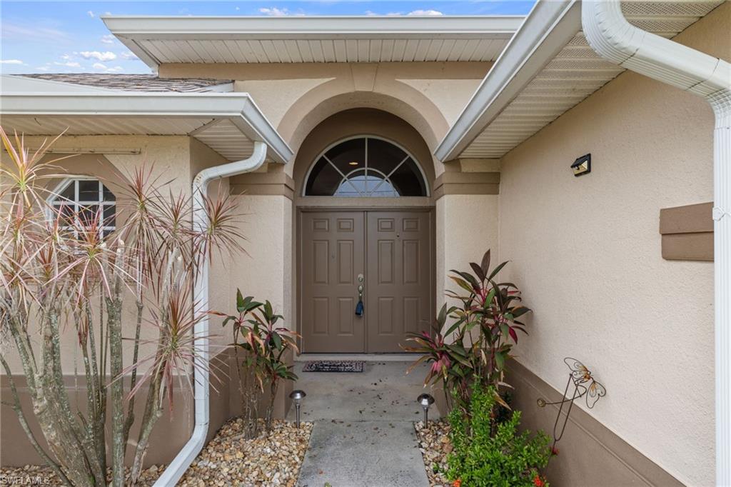 Photo of 932 SW 4th AVE, CAPE CORAL, FL 33991 (MLS # 226027304)