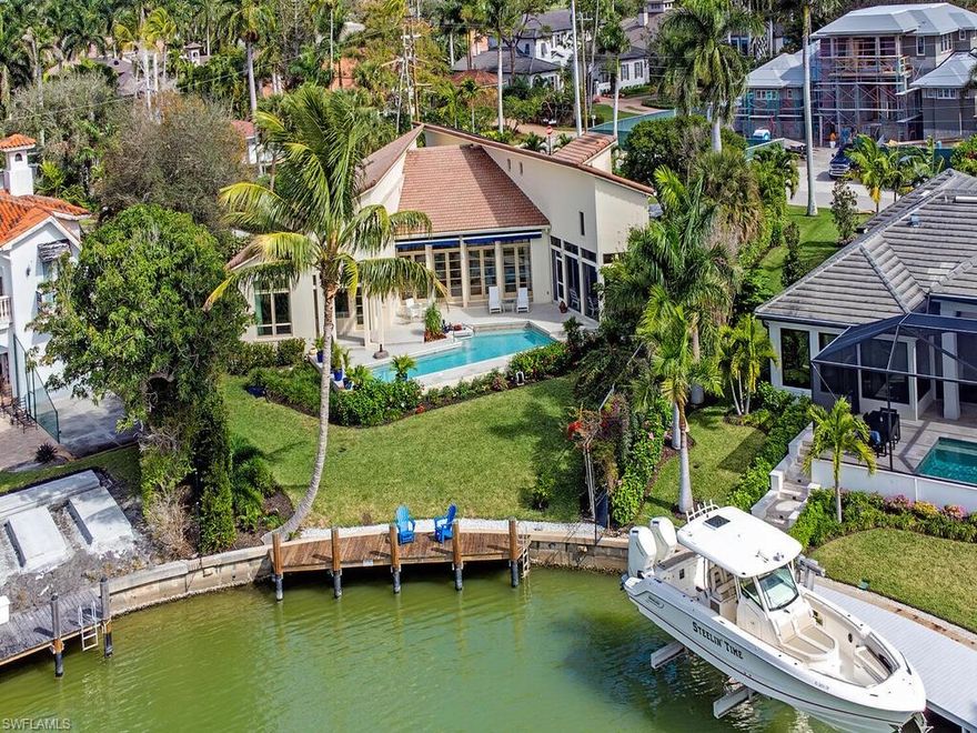 This Incredible home was the deserving Winner of the Southern Home Award. One of approximately 50 homes which have DIRECT GULF ACCESS through Doctors Pass. A rare opportunity to own a unique home, in a fabulous location, with a breath-taking view. Located in the desirable Moorings neighborhood just minutes from vibrant 5th Avenue, 3rd Street South, Venetian Bay and Waterside Shops for entertainment, dining and shopping. Optional membership available in The Moorings Park Owners Association  providing access to the 'communities cherished Beach Park'. An idyllic private southern exposure lot overlooking a bay inspired the simple geometry of this home. Three rectangular wings set at angles converge at the entry & widen out to water beyond. Unforgettable sunsets await you each evening. The bright open floor plan allows gentle tropical breezes to waft throughout. The lanai is perfect for entertaining outdoors. This home is where memories are made and can be yours.