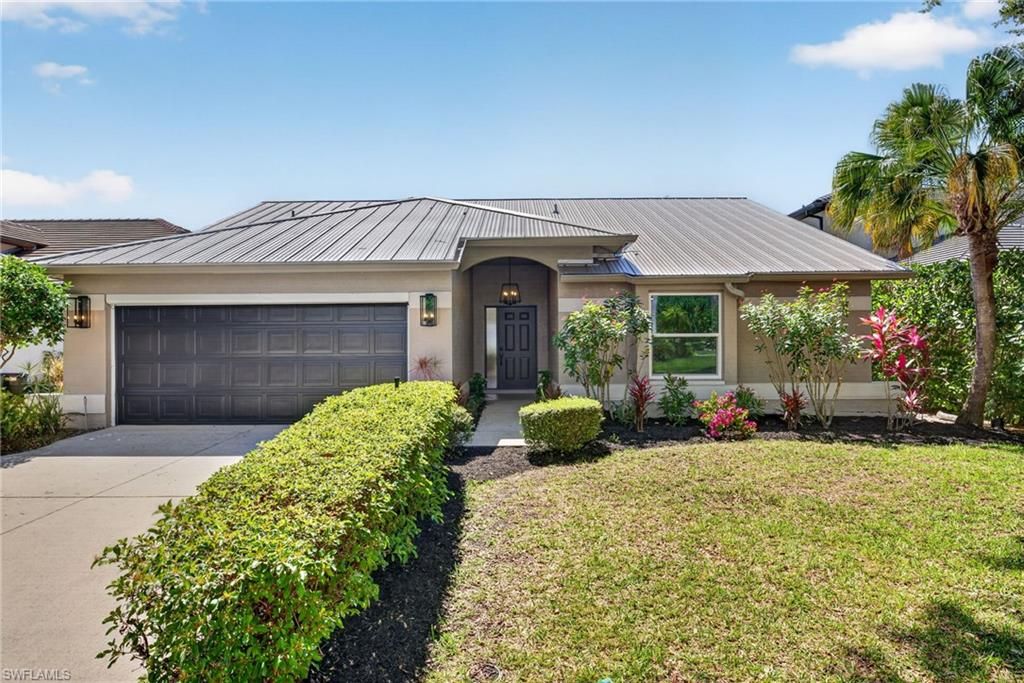 Photo of 10987 Fieldfair DR, NAPLES, FL 34119 (MLS # 226017129)
