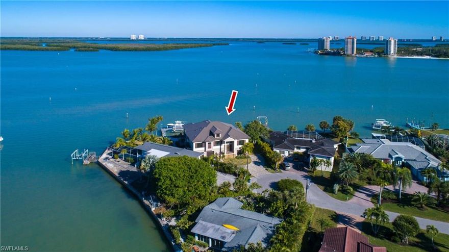 RECENTLY BUILT BAYFRONT DREAM HOME WITH UNPARALLELED BAY VIEWS & 200 FT ON THE WATER. Excellent location on the peaceful Southern-most tip of Estero Island, a boater’s DREAM with deep waters & Gulf access in MINUTES from one of the home’s 2 private boat lifts. This 2016-custom-built home sits on one of the very best lots on the island, a HUGE oversized & fenced cul-de-sac lot, a short walk to the sugar sand beaches of the Gulf of Mexico & minutes to shopping/dining. Incredible oversized Bayfront entertainment deck includes huge pool & spa, built-in outdoor kitchen & extra yardage on either side for ultimate privacy. Boasts all the amenities of new construction including impact glass windows & fully pocketing sliders, private elevator & open floor plan with 4+ car garage & bonus space available for even more living space. Gourmet chef’s kitchen boasts custom-made dual-tone cabinetry, the finest of granite counters & backsplash, HUGE eat-in island & stainless-steel Monogram appliance suite with gas range, double ovens & wine cooler. From the hardwood & marbled tile floors, to the gorgeous tray ceilings, to the stunning modern baths throughout, this home leaves no detail left undone.