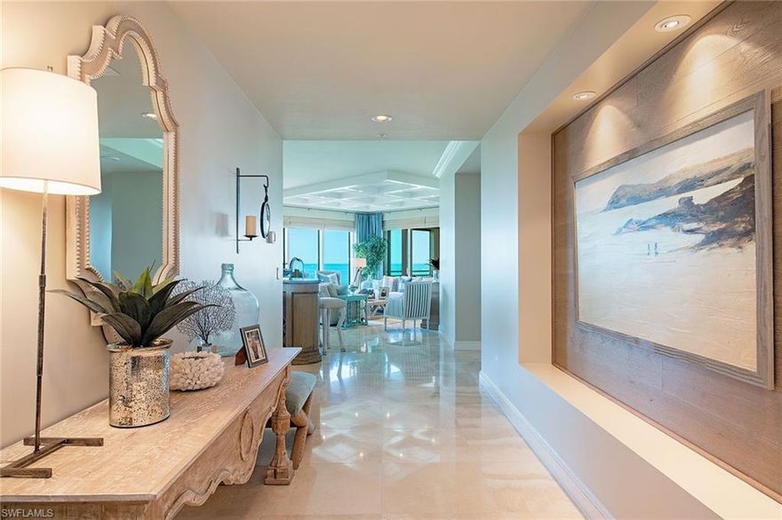 Stylishly renovated in sophisticated coastal décor by Renee Gaddis Interiors, this four-bedroom, four-bath southwest corner residence is the perfect beach house. It lives like a single-family home with formal and informal living and dining areas. The two large screened-in and shuttered terraces, one with extra sliders for weather protection, provide plenty of outdoor living and dining options. The home is located in Provence, one of the premier buildings on the beach, which offers an array of luxury amenities and across-the-street proximity to the shopping, dining and marina at Venetian Village.