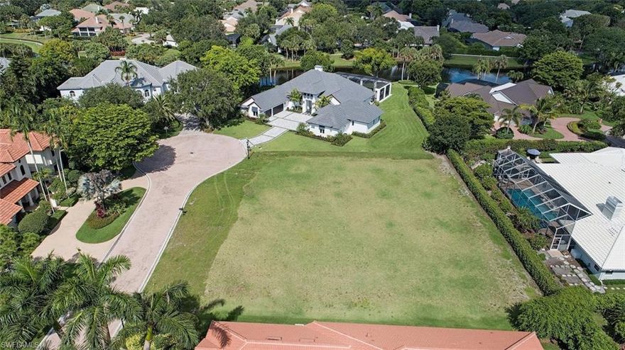 L.2437 - The only vacant lot in Pelican Bay, offering the rare opportunity to build your dream home on .48 acres.  A quiet, cul-de-sac, cobblestone street, of only 6 lovely homes.  Pelican Bay is a beach community, residents enjoy 2 private beachfront restaurants, attended beach service, fitness center, 18 tennis courts, learning center, kayaking, biking, miles of walking, over 500 acres of mangroves, estuaries, nature paths and so much more. Artis Naples Performing Arts Center, Waterside Shops /Restaurants, and Mercato are just minutes away.  If it's golf you're looking for, join the Club at Pelican Bay, with 27 holes of championship golf and a new state of the art clubhouse.