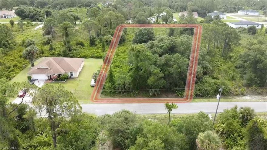 Unlock endless possibilities with this 0.50-acre residential vacant lot in Lehigh Acres, offering a serene and quiet living environment with easy access to city conveniences, major roads, and nearby cities like Fort Myers and LaBelle, making it an ideal investment opportunity for custom homebuilders and investors alike.