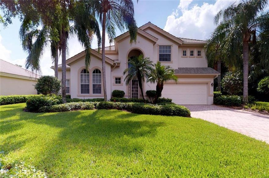 In low density Woodmont, one of 31 fine homes, with 4 BR + Den and 4 baths. All NEW stainless kitchen appliances installed December 2017. Entry with soaring 22' ceiling and sweeping lake view, facing southeast, with background north course #16 green surrounded by picturesque natural rock. There is no house to right of lanai providing utmost privacy. Large lanai has free-form pool & spa, paver stone deck & sitting area protected by electric hurricane shutters. Kitchen w/ granite counters, walk-in pantry, tiled backsplash & breakfast bar adjacent to casual dining area. Extensive use of bamboo engineered wood flooring in first floor living area, den and master bedroom. Master bedroom on first floor w/ tray ceiling, 2 walk-in closets, en-suite master bath, dual sinks, separate tub and tiled shower and linen closet. Second floor has second master bedroom with en-suite bath plus 2 bedrooms sharing full bath. Abundant private space for visitors. 2 zoned HVAC, new 2013. Water heater new 2014. Wireless indoor pool controls. 2 car attached garage. Optional turnkey purchase. 5 min to shopping mall, 20 to private Gulf beach club. SWCC with 3-18 golf hole courses, tennis & bocce, not mandatory.