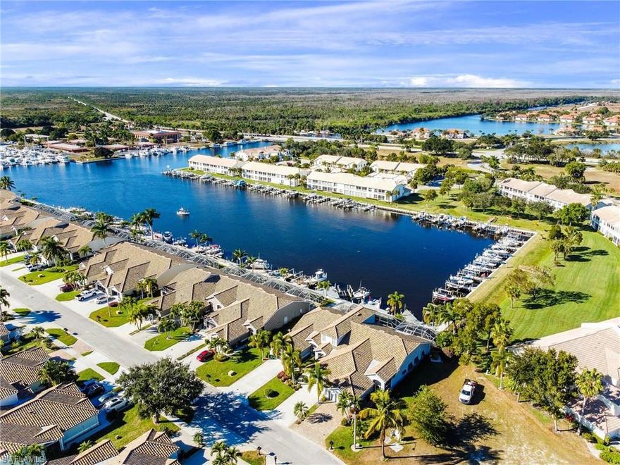 PORT OF THE ISLANDS “STELLA MARIS” WATERFRONT VILLA! THIS HOME FEATURES: 3 BEDROOMS, 2 BATHS, GARAGE, POOL & BOAT DOCK W/BOAT LIFT. THIS OPEN FLOOR PLAN HOME INCLUDES: ALL TILE FLOORS FOR "EASE-OF-MAINTENANCE", BIG “CHEFS KITCHEN” WITH LOTS OF COUNTER SPACE, EAT-IN KITCHEN W/ ATTACHED BREAKFAST BAR, NEW STAINLESS-STEEL APPLIANCES & DESIGNER CABINETRY.  MASTER BEDROOM EQUIPPED W/ HIS & HER WALK-IN CLOSETS, TILED WALK-IN SHOWER & SEPARATE SOAKING TUB. HUGE LANAI FOR EVENING FAMILY GATHERINGS AND ELECTRIC ROLL-DOWN HURRICANE SHUTTERS & GENERATOR HOOKUP READY FOR INSTALLATION SHOULD YOU CHOSE. NEW ROOF (2018), NEW A/C (2016). LOW HOA FEES THAT INCLUDE: ACCESS TO THE COMMUNITY HOTEL, THE  POOL & TENNIS COURTS. DON’T WAIT, THIS VALUE PROPERTY WONT LAST LONG!
