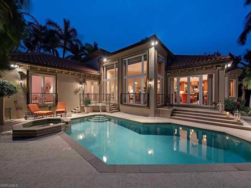 Privacy and proximity to all of Naples amenities can be found in this inviting, well-proportioned two-story home in Gordon Drive Estates (fomerly known as Palmer Estates) - a mews of only nine homes on the edge of Olde Naples in Aqualane Shores. 

The architectural elements in this home with 4,332 square feet under air speak to its traditional elegance: quality finishes and hardware, beautifully turned woodwork and trims, and solid-core doors throughout, all bathed in a color palette chosen to reflect sea, sand and sunlight. It begins with a dramatic staircase that draws the eye from the circular drive, into the grand foyer. From there, enter the large salon with volume ceilings and French doors leading to an expansive southwest-facing lanai paved with honed marble and surrounding the 30’x17’ pool and attached spa. Also on the first floor: a handsome, well-appointed study/library; an adjacent “holiday ready” formal dining room with access to the eastern terrace (Morning coffee, anyone?); a well-appointed kitchen with island, two dishwashers, wine cooler, and family dining alcove; a spacious gathering room with abundant light and access to the lanai and pool. The primary suite, also on the first floor, features a spa-like bath with tub, shower and dual vanities, a custom closet and beautiful views of the manicured landscape. On the second level: two guest bedrooms, ensuite, and a charming loft space, ideal for use as a play room or get-away reading nook. The two-bay garage accommodates extra storage needs. This home is in the “beach block” with private access through a gated easement available to residents of Gordon Drive Estates.