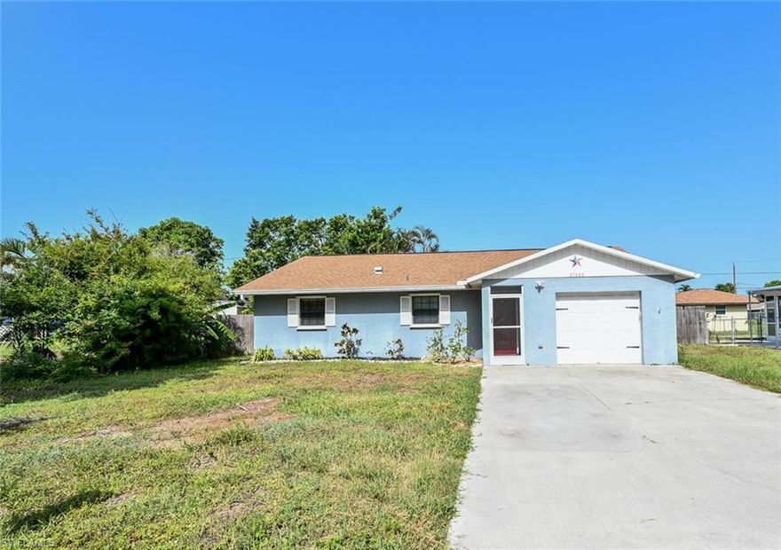 Fabulous location, just minutes from Downtown Riverside Park where you and your friends can enjoy great concerts and festivals on the green. Historic Bonita Springs offers quaint restaurants and kayak rentals on the Imperial River. This home is the perfect opportunity for a starter home of for use as an investment opportunity. The range, microwave, dishwasher, washer, dryer and water heater were replaced by the owner. More recent replacements are the shingle roof in 2021 and the A/C system in 2019. Open floor plan offers options for the Den/Flex room and glassed in sun room which leads to the screened in lanai. The washer and dryer are located in the oversized garage which is finished with numerous storage cabinets. There are manual hurricane shutters for storm protection. The yard is fenced for privacy and includes a storage shed for the lawn equipment. This home was untouched by Hurricane Ian and did not receive any damage. No HOA fees here, this home is located on a non-gated street with no thru traffic.