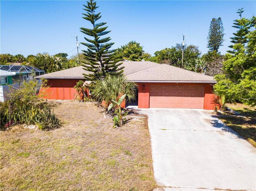 Located in a tucked away neighborhood, this charming split 3 bed, 2 bath home is only two minutes from Downtown Cape Coral, and less than 10 minutes from local beaches and parks. Features include a den, large family room, two car garage, and a fully enclosed addition that now serves as a bright extension to the rear of the home. Hurricane rated impact windows were installed in 2016, and there are awning shutters in place to serve as additional protection. The back patio has a 270 degree view of the yard, with full enclosure windows that can be opened for fresh air in temperate weather or closed to provide additional lounging with the window air conditioner option already installed and independent of the home's central air conditioning. Perfect for cooking and entertaining! Whole home networking was installed to allow easy, high-speed cabled internet access throughout the home. Indigenous plants surround the yard to provide privacy and shade.