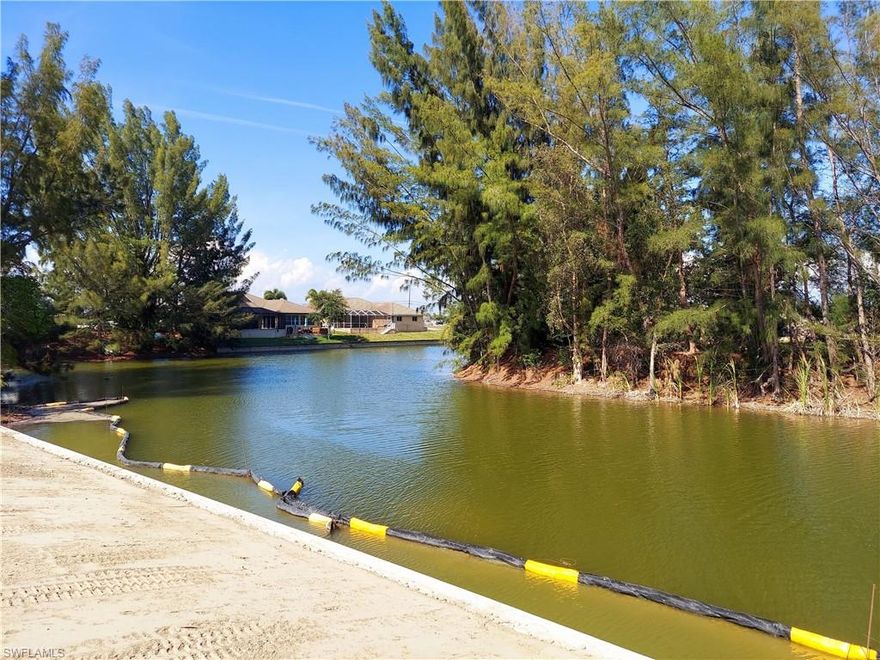 Imagine sitting on your newly built pool deck in the sun while working from home! This FRESHWATER lot is located in the newly developed area with city water and sewer and numerous new homes all around. Enjoy the Groceries, doctor offices, restaurants all nearby. Close to Fort Myers, the Airport and all the beaches that Southwest Florida is well-known for. SEAWALL already installed. You can start building - no waiting time for installing a seawall.